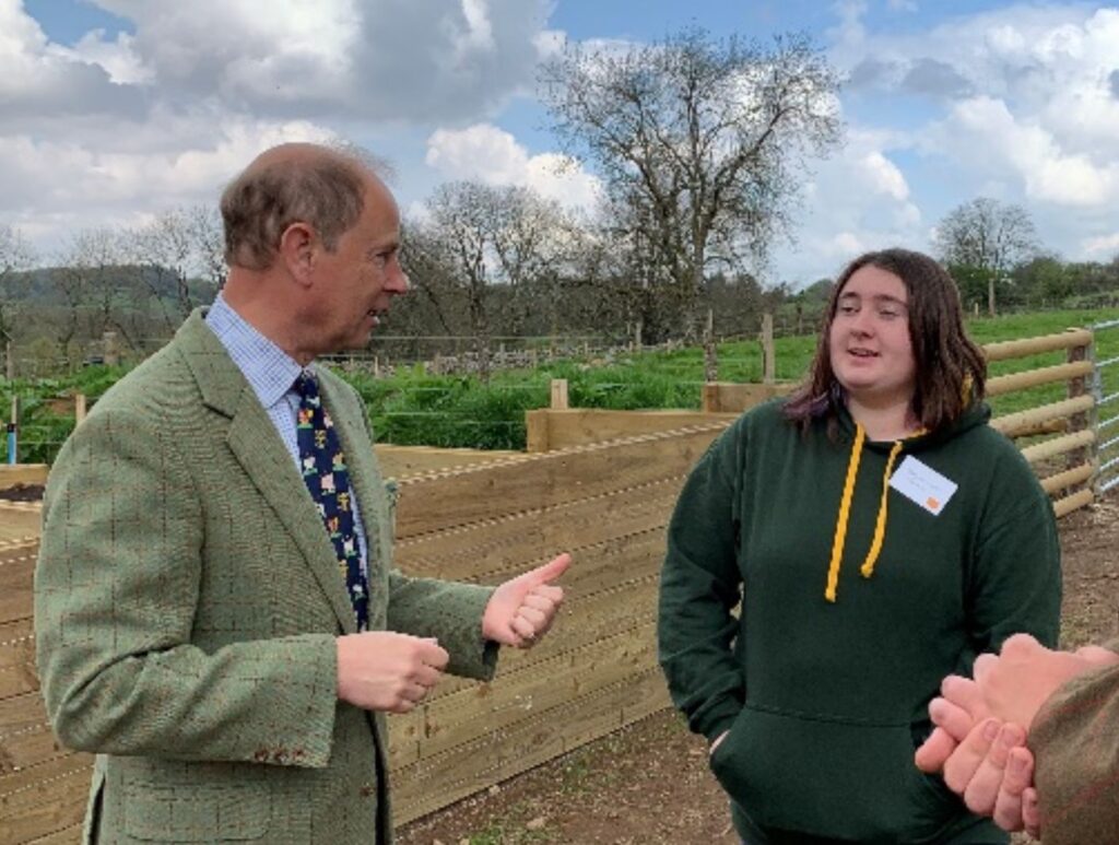 Georgina discussing chickens with HRH the Duke of Wessex